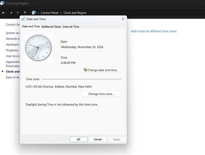How do I set Eastern time zone in Windows 7?