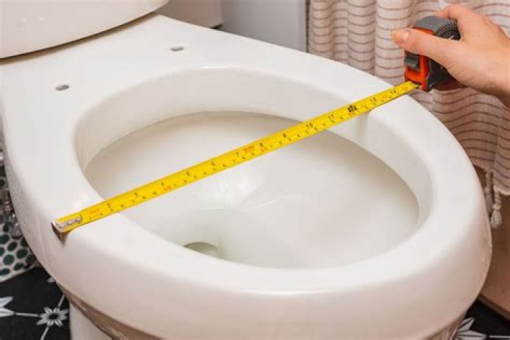 How do you measure to replace a toilet?
