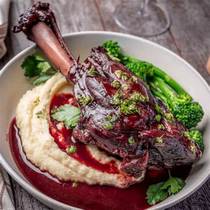 How do you reheat braised lamb shanks?