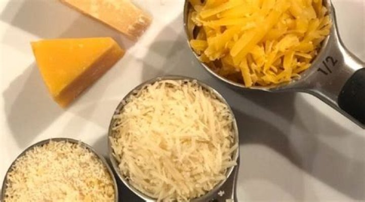 How many cups is half a pound of shredded cheese?
